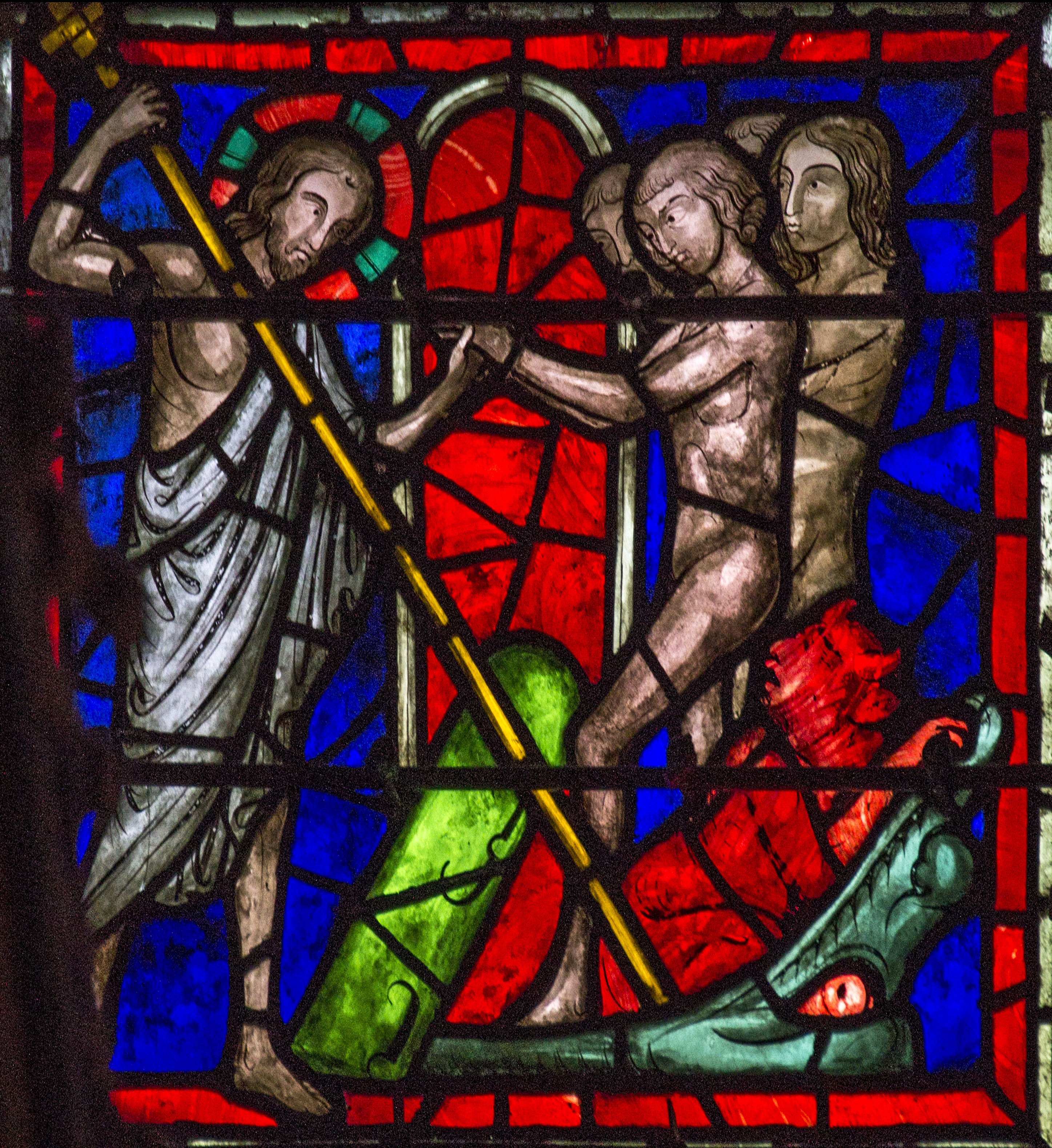 Le Christ secourt un homme aux prises avec les mâchoires de la mort – Vitrail médiéval de la Sainte-Chapelle, Paris.